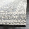 Safavieh Micro-Loop 5' x 8' Hand Tufted Wool Rug in Blue and Ivory