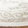 Safavieh Micro-Loop 5' Round Hand Tufted Wool Rug in Ivory and Fuchsia