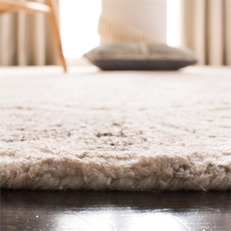 Safavieh Marquee 4' x 6' Hand Tufted Wool Rug in Beige and Ivory