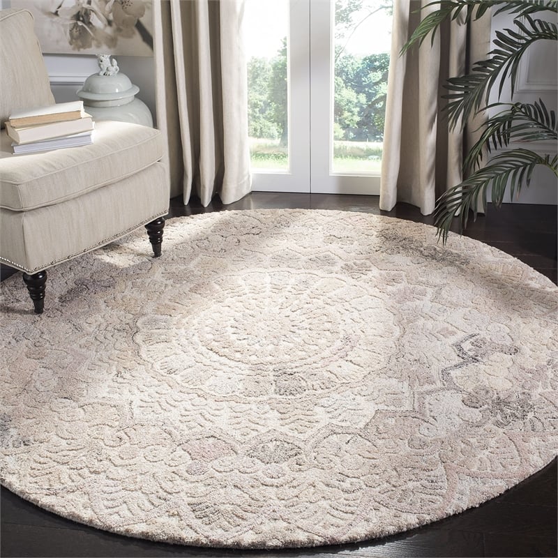 Safavieh Marquee 6' Round Hand Tufted Wool Rug in Beige and Ivory