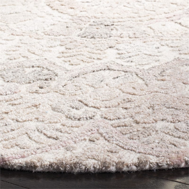 Safavieh Marquee 6' Round Hand Tufted Wool Rug in Beige and Ivory