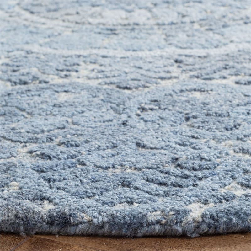 Safavieh Marquee 6' Round Hand Tufted Wool Rug in Blue and Ivory