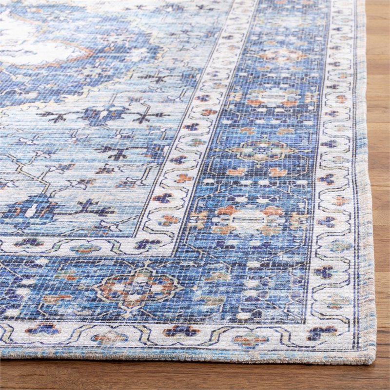 Safavieh Saffron 5' x 8' Rug in Blue and Ivory