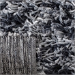 Safavieh Rio 5' x 8' Hand Loomed Shag Rug in Black and Ivory