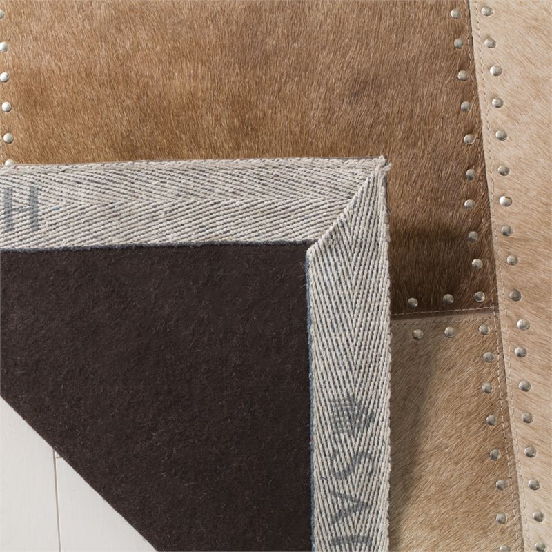 Safavieh Studio 5' x 8' Hand Woven Leather Rug in Beige and White
