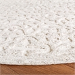 Safavieh Trace 6' Round Hand Tufted Wool Rug in Camel and Ivory