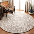 Safavieh Trace 6' Round Hand Tufted Wool Rug in Brown and Ivory