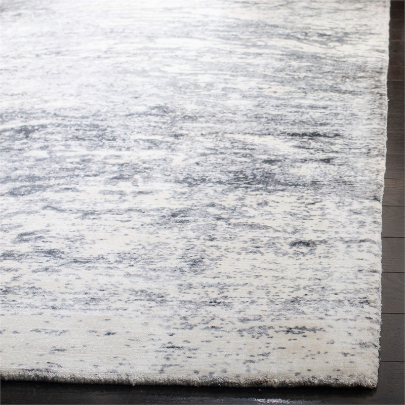 Safavieh Mirage 9' x 12' Hand Loomed Rug in Blue and Ivory
