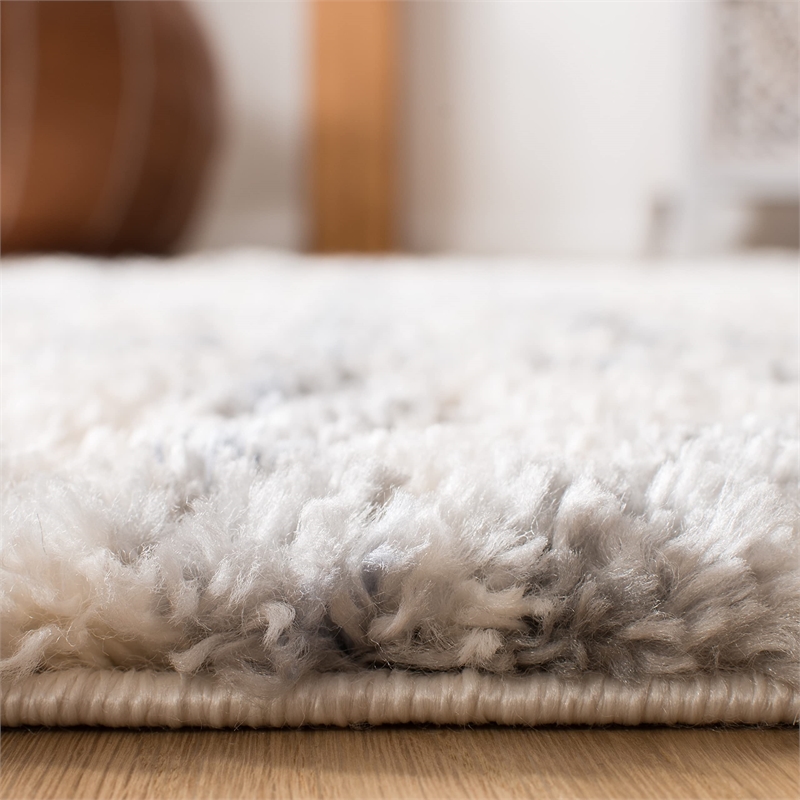 Safavieh Berber 9' x 12' Shag Rug in Cream and Gray