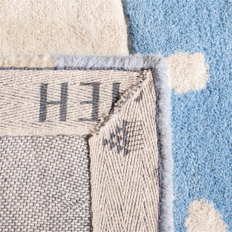 Safavieh 8' x 10' Hand Tufted Wool Rug in Blue and Ivory