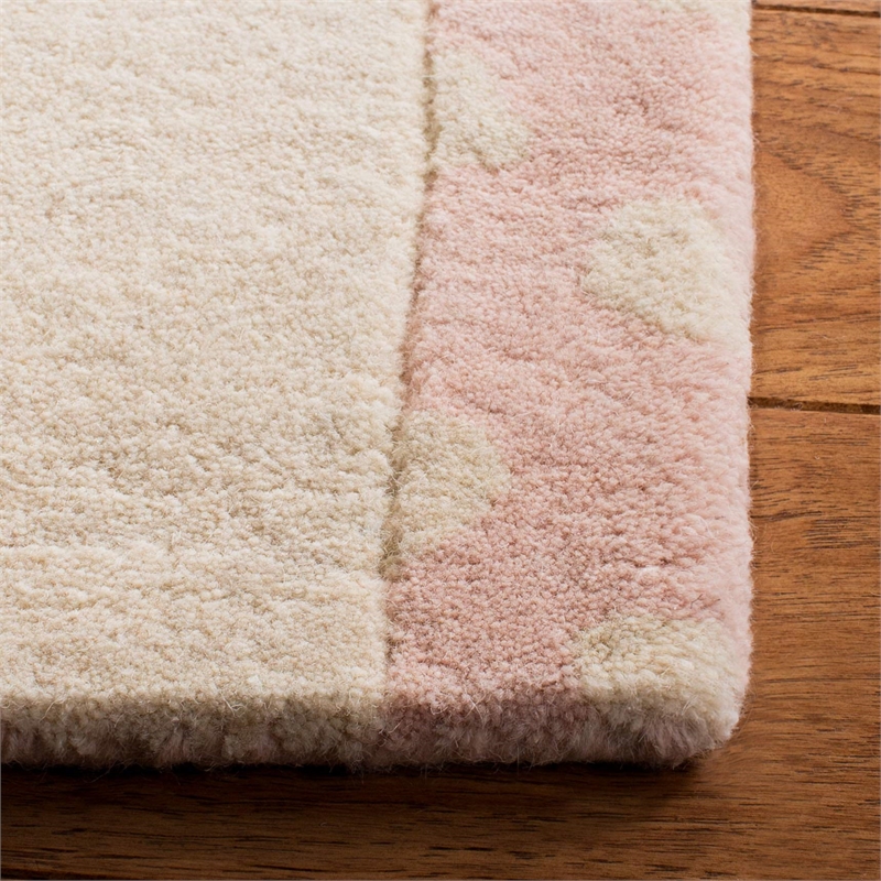 Safavieh 4' x 6' Hand Tufted Wool Rug in Pink and Ivory