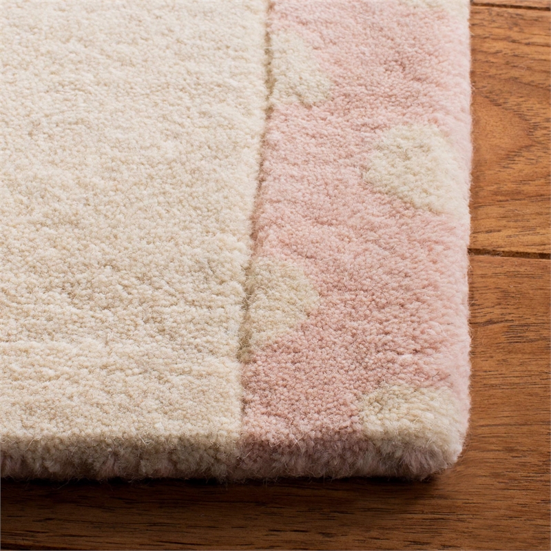 Safavieh 8' x 10' Hand Tufted Wool Rug in Pink and Ivory