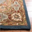 Safavieh Heritage 6' x 9' Traditional Hand Tufted Wool Rug in Green and Red