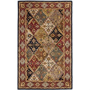 Safavieh Heritage 6' x 9' Traditional Hand Tufted Wool Rug in Green and Red
