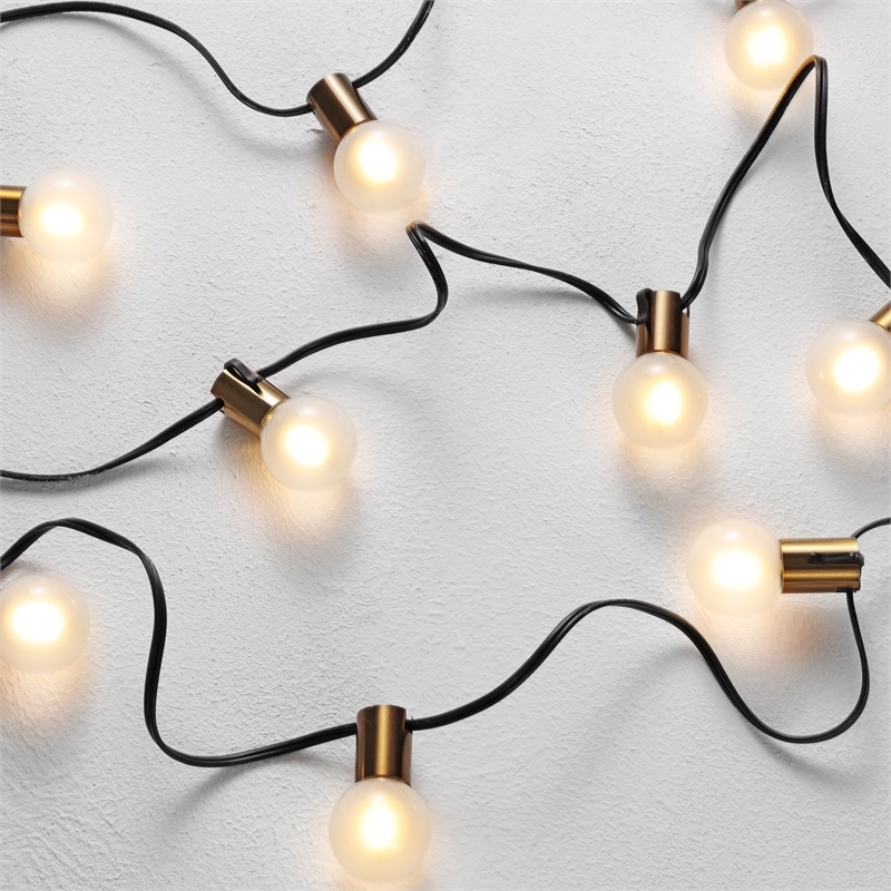 Safavieh Farrynn LED Metal and Glass Outdoor String Light in Brass / Black