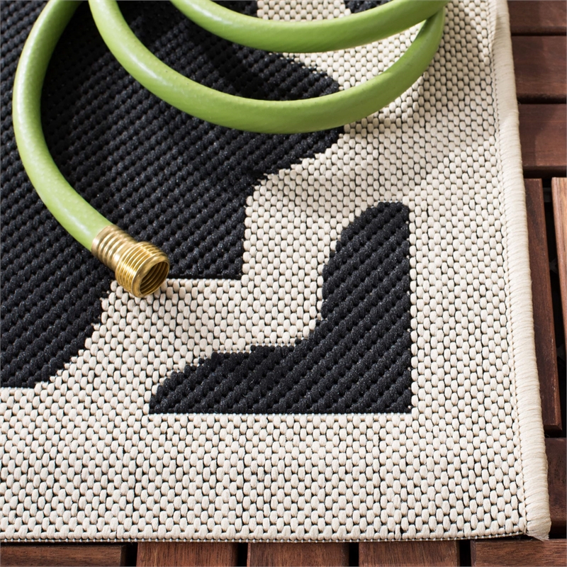 Safavieh Courtyard Polypropylene Medium Rectangle Rug CY6913-266-6 in Black and Beige