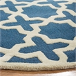 Safavieh Cambridge 4' X 4' Round Wool Hand Tufted Rug in Navy  / Ivory