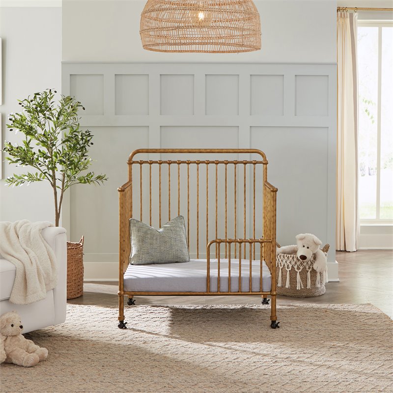 Namesake Winston Metal 4-in-1 Convertible Mini Crib in Vintage Gold