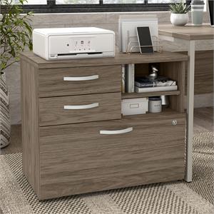 hybrid office storage cabinet with drawers in modern hickory - engineered wood