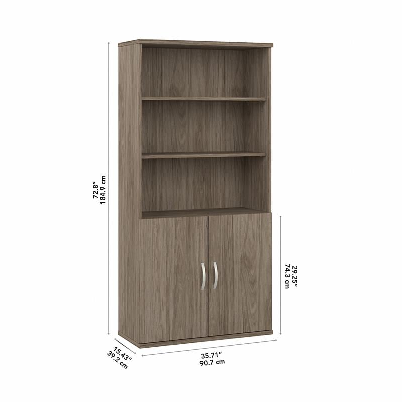 Hybrid Tall 5 Shelf Bookcase with Doors in Modern Hickory - Engineered Wood