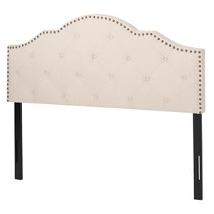 noble house cordeaux upholstered headboard in beige and black