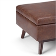 Simpli Home Owen Faux Leather Storage Coffee Table Ottoman in Saddle Brown