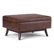 Simpli Home Owen Faux Leather Storage Coffee Table Ottoman in Saddle Brown
