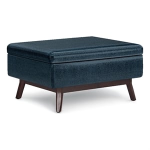 Simpli Home Owen Faux Leather Coffee Table with Storage in Distressed Dark Blue