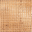 Baxton Studio Lingga Dark Brown Mahogany Wood and Natural Rattan Counter Stool
