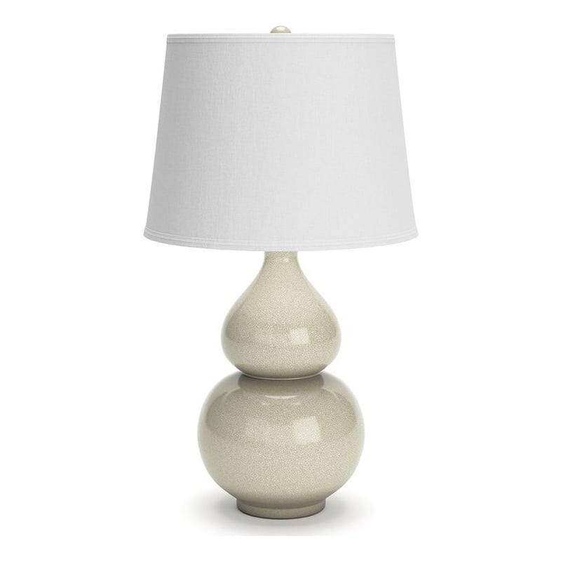 Signature Design by Ashley Saffi Ceramic Table Lamp in Cream