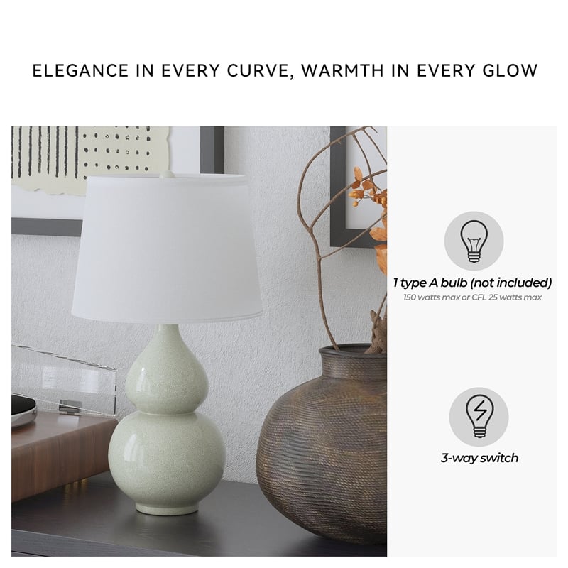 Signature Design by Ashley Saffi Ceramic Table Lamp in Cream