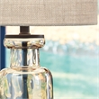 Signature Design by Ashley Laurentia Glass Table Lamp in Champagne