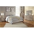 Signature Design by Ashley Dolante Tufted King Panel Bed in Beige