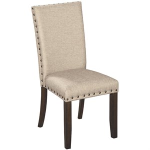 ashley furniture rokane dining side chair with nailhead trim in beige