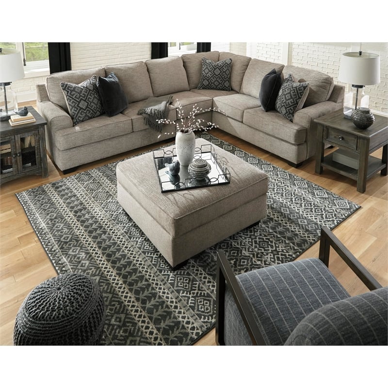 Signature Design by Ashley Bovarian Ottoman with Storage in Stone