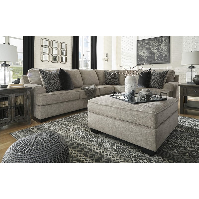 Signature Design by Ashley Bovarian Ottoman with Storage in Stone