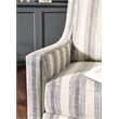 Signature Design by Ashley Kambria Swivel Glider Accent Chair in Ivory and Black