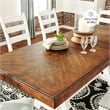 Signature Design by Ashley Valebeck Rectangular Dining Table in White and Brown