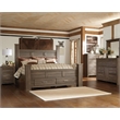Signature Design by Ashley Juararo Poster King Bed in Dark Brown