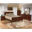Signature Design by Ashley Alisdair Sleigh Cal King Bed in Warm Dark Brown