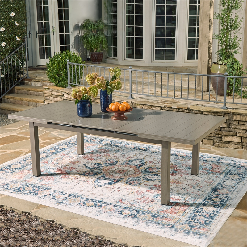 Ashley Furniture Beach Front Outdoor Rectangular Aluminum Dining Table in Brown