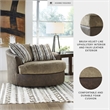Ashley Furniture Alesbury Oversized Faux Leather Swivel Accent Chair in Brown