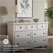 Ashley Furniture Robbinsdale 7-Drawer Wood Dresser in Antiqued White