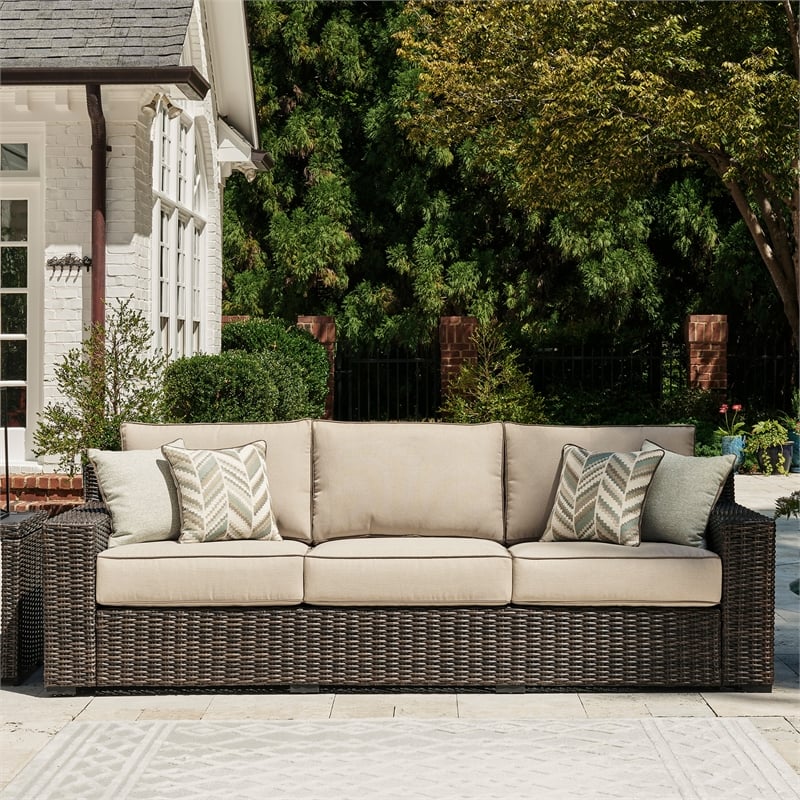 Signature Design by Ashley Coastline Bay Brown Outdoor Sofa with Cushion