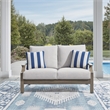 Signature Design by Ashley Rainier Ranch Brown Outdoor Loveseat with Cushion