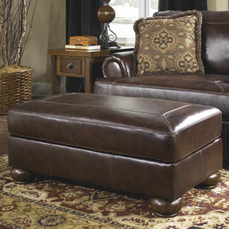 Ashley Furniture Axiom Leather Ottoman in Walnut 4200014