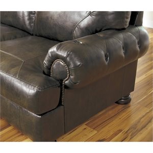 Ashley Nesbit 4 Piece Leather Sectional with Ottoman in Antique