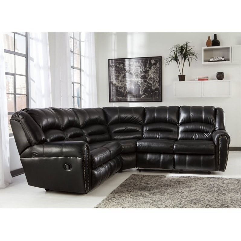 Ashley Manzanola 2 Piece Faux Leather Reclining Sectional in Black