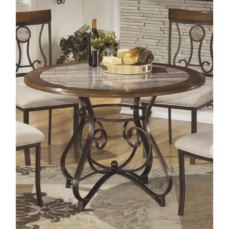 Ashley Hopstand Round Dining Table with Faux Marble Inset in Brown