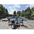 Compamia Ibiza Patio Dining Arm Chair in Dark Gray
